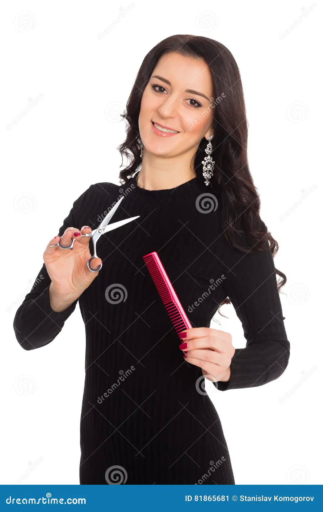 hairdresser holding scissors.